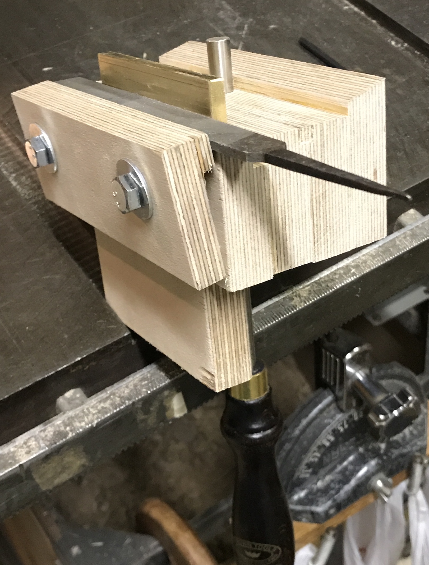 Completed scraper jig